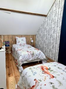 Maisons d'hotes La Grange Aux Hirondelles - Chambre familiale : photos des chambres