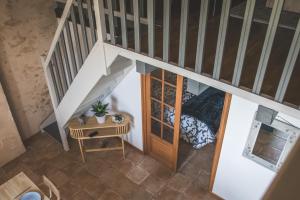 Appartements L-intendance - calme et cosy, vieilles pierres : photos des chambres