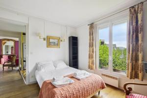 Appartements Authentic Parisian apartment : photos des chambres