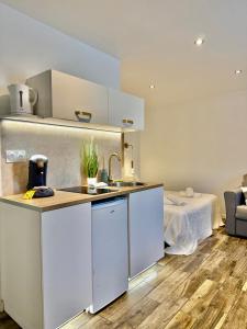 Appartements Studio 1 - Cinema Sport Parking - DABNB : photos des chambres