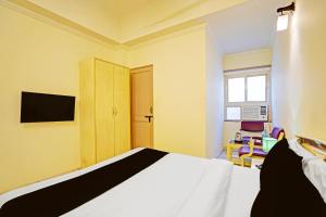 Super Townhouse Oak Nirman Nagar Mansarovar Formerly The Tulip Regency