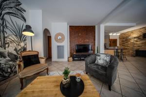 Appartements « L’atelier » halte charmante et reposante : photos des chambres