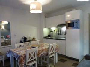 Appartements Appartement familial dans un chateau avec piscine chauffee, proche plages et sites du Golfe du Morbihan : photos des chambres