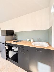 Appartements Le Cocon - Jardin - Wifi : photos des chambres