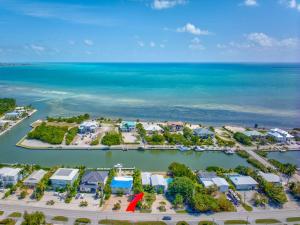 Easy Breezy Family Complex 5BR 3BTH 100ft Dock Pool & Beach
