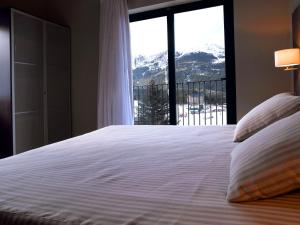 Quadruple Room (2 Adults + 2 Children) room in HG La Molina