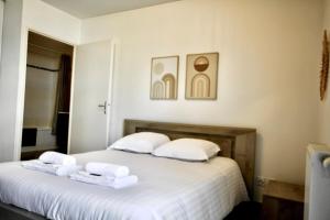 Appartements Appartement proche grands axes - parking prive : photos des chambres