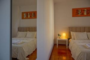 Quarto duplo com vista rio num apartamento partilhado