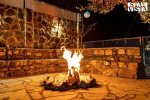 StayVista at Alpine Bliss - Home Theatre, Bonfire