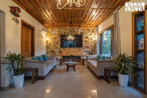 StayVista at Alpine Bliss - Home Theatre, Bonfire