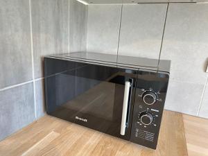 Appartements Elegant 2 Bedroom Apartment with Free Parking Paris St-Denis by Immo Kit BNB : photos des chambres