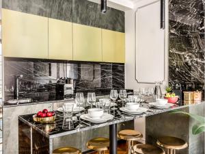 Appartements Merveil - Luxury Suite - Louvre - Sebastopol II : photos des chambres