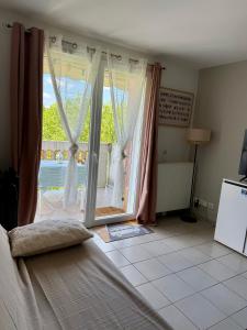 Appartements Appartement 1 chambre avec piscine : photos des chambres