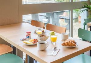 Hotels B&B HOTEL Toulouse Cite de l'Espace Hurel : photos des chambres
