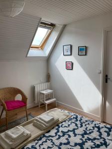 Maisons de vacances La maison des Teinturiers maison de ville avec jardin : photos des chambres