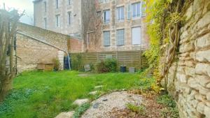 Appartements Maison cosy avec jardin – Centre de Poitiers : photos des chambres