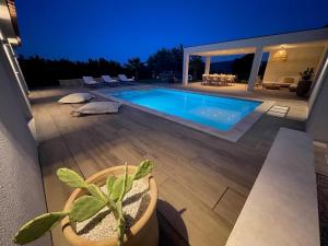 Maisons de vacances Villa Loura - Villa contemporaine avec piscine : photos des chambres
