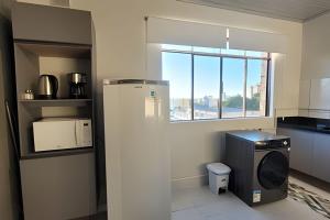 AP103 - Apartamento com AC no centro