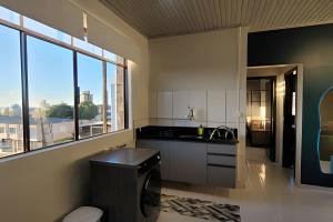 AP103 - Apartamento com AC no centro