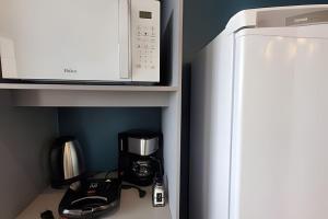 AP102 - Apartamento com AC no centro