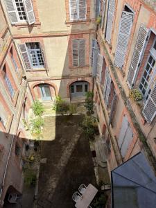 Appartements Le Dix, emplacement exceptionnel, parking inclus : photos des chambres