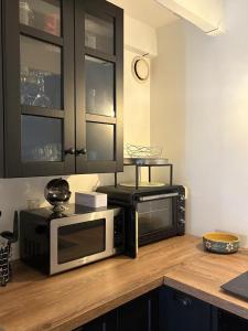 Appartements Le Dix, emplacement exceptionnel, parking inclus : photos des chambres