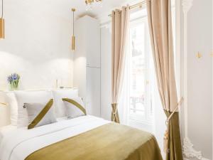 Appartements Merveil - Signature Suite - Louvre - Victoria : photos des chambres