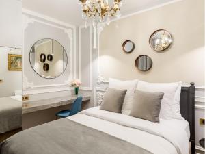 Appartements Merveil - Signature Suite - Louvre - Victoria : photos des chambres