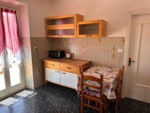 Casa con terrazza nel verde