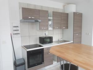 Appartements 1A studio a neuf Tout equipe : photos des chambres