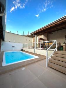 Casa com Piscina em Marmelópolis