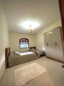 Casa com Piscina em Marmelópolis