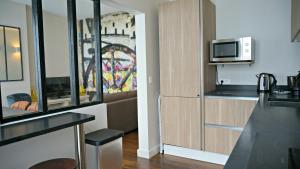 Appartements Little Suite - Alix : photos des chambres