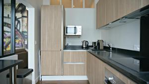 Appartements Little Suite - Alix : photos des chambres