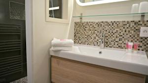 Appartements Little Suite - Alix : photos des chambres