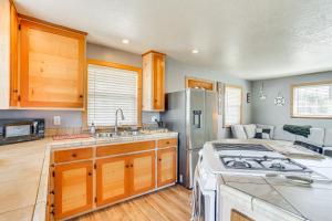Less Than 1 Mi to Lake Almanor Home with Furnished Decks!