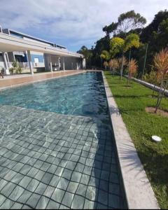 Aconchego da Alê em Porto, Ar condicionado e Piscina, Apartamento inteiro, Cozinha completa, Wifi, 02 Quartos confortáveis, travesseiro nasa , Colchão confortável ideal para férias descanso lazer ou negócios