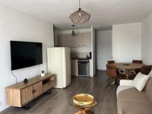 Appartements Appartement plus place de parking en sous sol privatif : photos des chambres