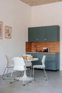 Skyrise Aparthotel Rammingen - Moderne Apartments mit Küche & Parkplatz