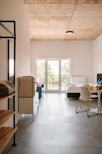 Skyrise Aparthotel Rammingen - Moderne Apartments mit Küche & Parkplatz