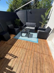 Appartements Logement avec terrasse et parking : photos des chambres