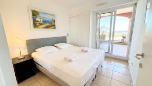 Appartements T3, Splendide vue Mer, Piscine, Tennis By Palmazur Vacances : photos des chambres