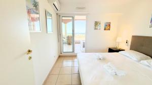 Appartements T3, Splendide vue Mer, Piscine, Tennis By Palmazur Vacances : photos des chambres