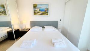 Appartements T3, Splendide vue Mer, Piscine, Tennis By Palmazur Vacances : photos des chambres