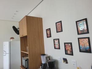 Casa funcional - 02 quartos, 02 camas de casal, 01 cama de solteiro, cozinha gourmet e garagem para carro pequeno