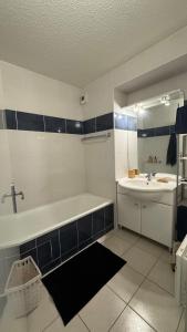 Appartements Logement de la Daurade : photos des chambres