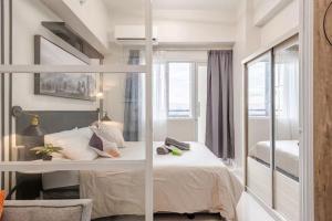 Modern Minimalist Studio with Balcony & Sunset View