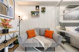 Modern Minimalist Studio with Balcony & Sunset View