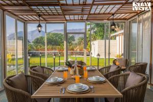 StayVista at The Five Oaks - Private Pool Cottages