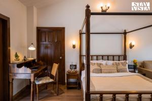 StayVista at The Five Oaks - Private Pool Cottages